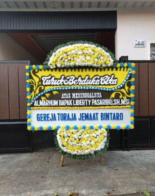 Papan Bunga Duka di Dolok Pardamean